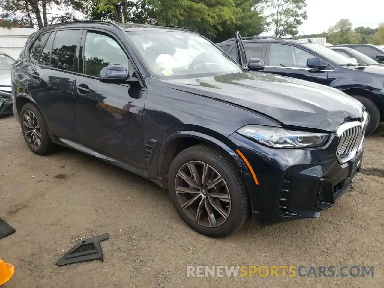 4 Photograph of a damaged car 5UX23EU05R9W00432 BMW X5 2024