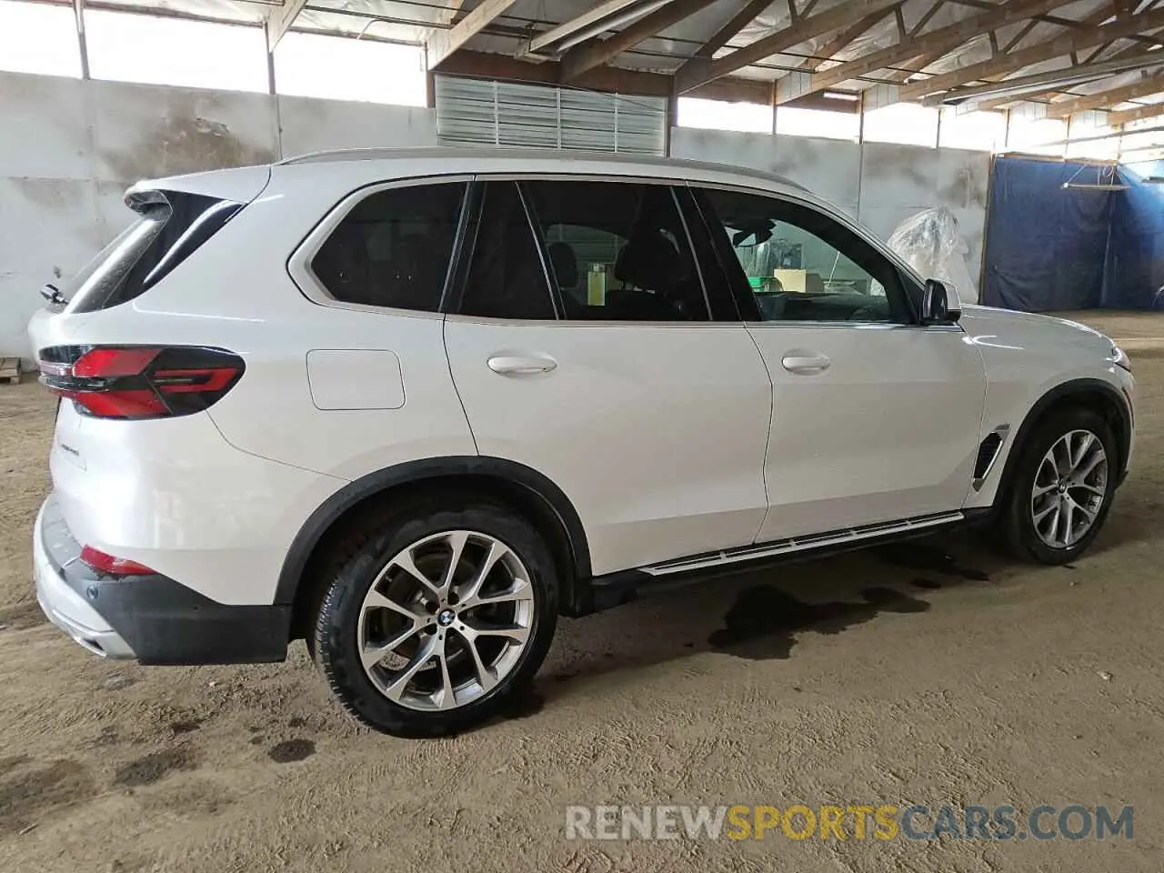 3 Photograph of a damaged car 5UX23EU08R9U20992 BMW X5 2024