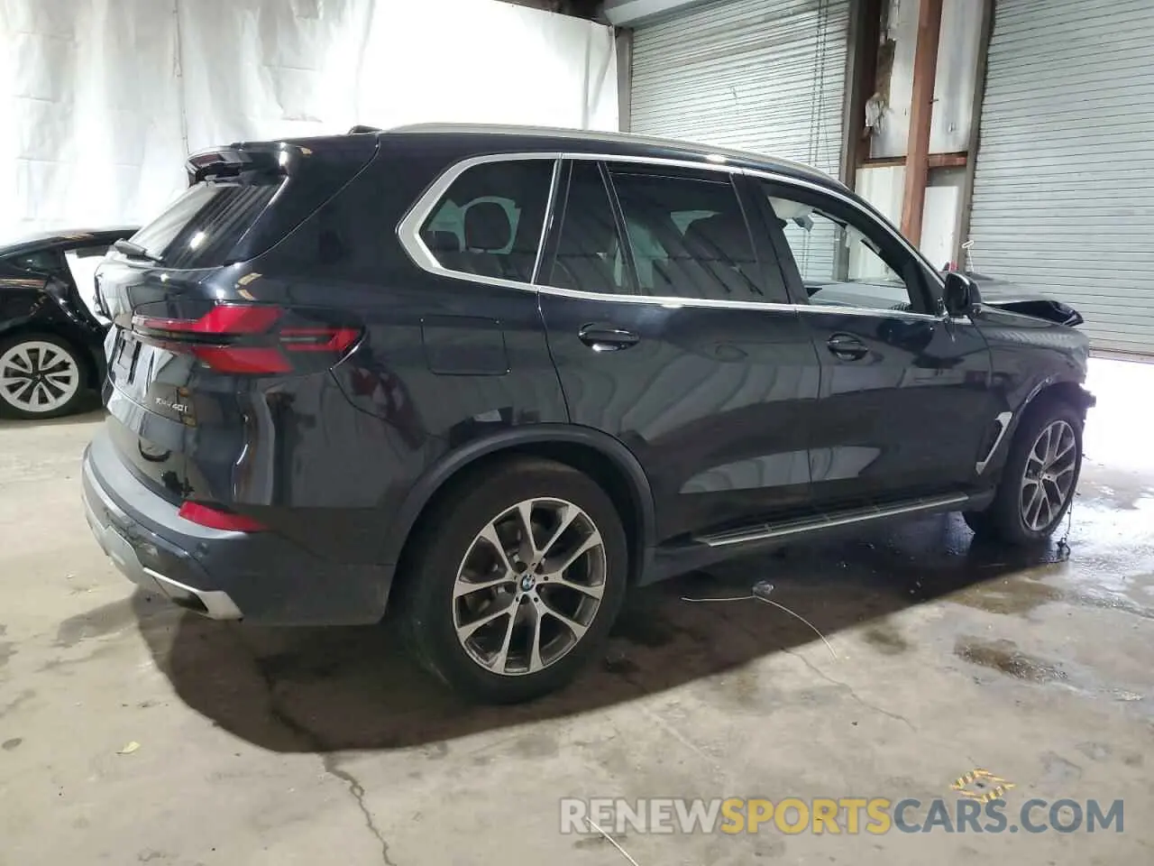 3 Photograph of a damaged car 5UX23EU08R9V74411 BMW X5 2024