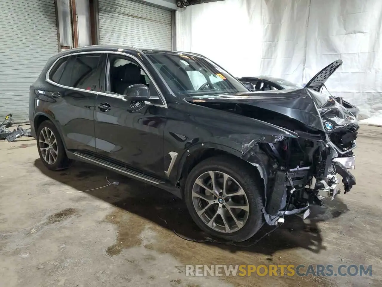4 Photograph of a damaged car 5UX23EU08R9V74411 BMW X5 2024