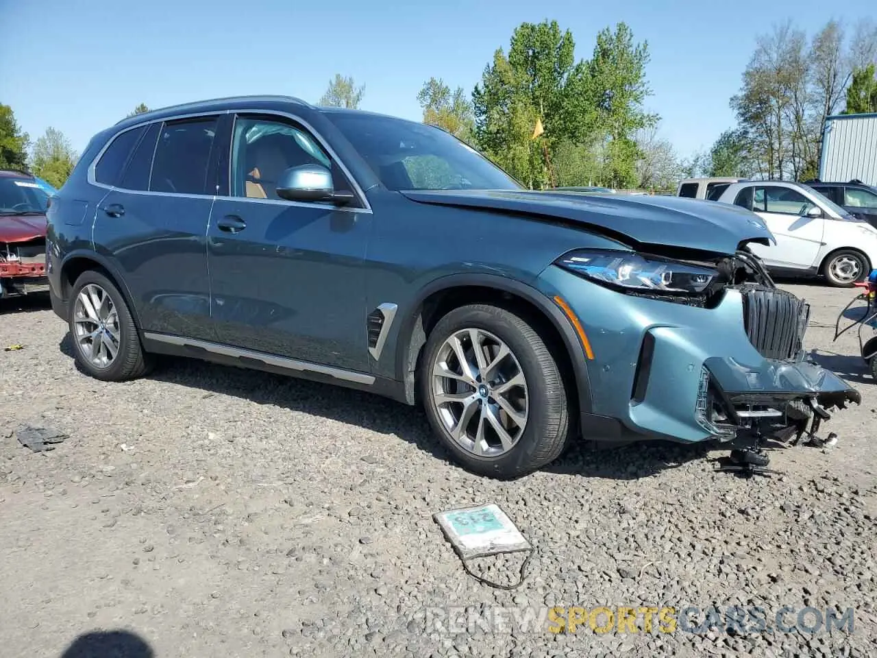 4 Photograph of a damaged car 5UX43EU01R9T80389 BMW X5 2024