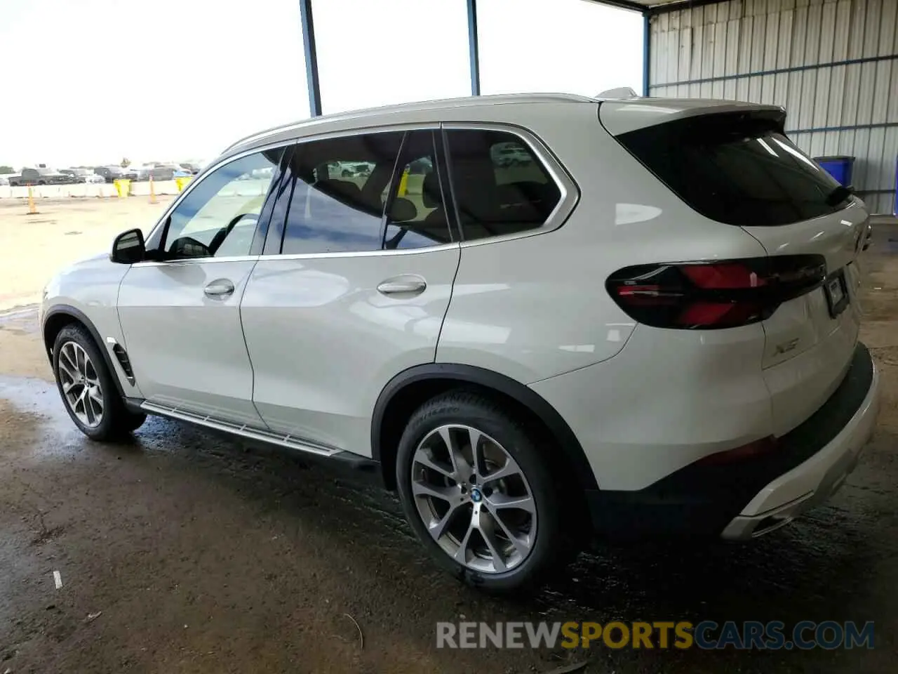 2 Photograph of a damaged car 5UX23EU03S9Z14103 BMW X5 2025