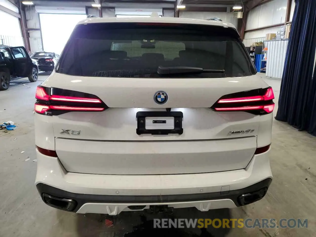 6 Photograph of a damaged car 5UX43EU00S9Y74040 BMW X5 2025