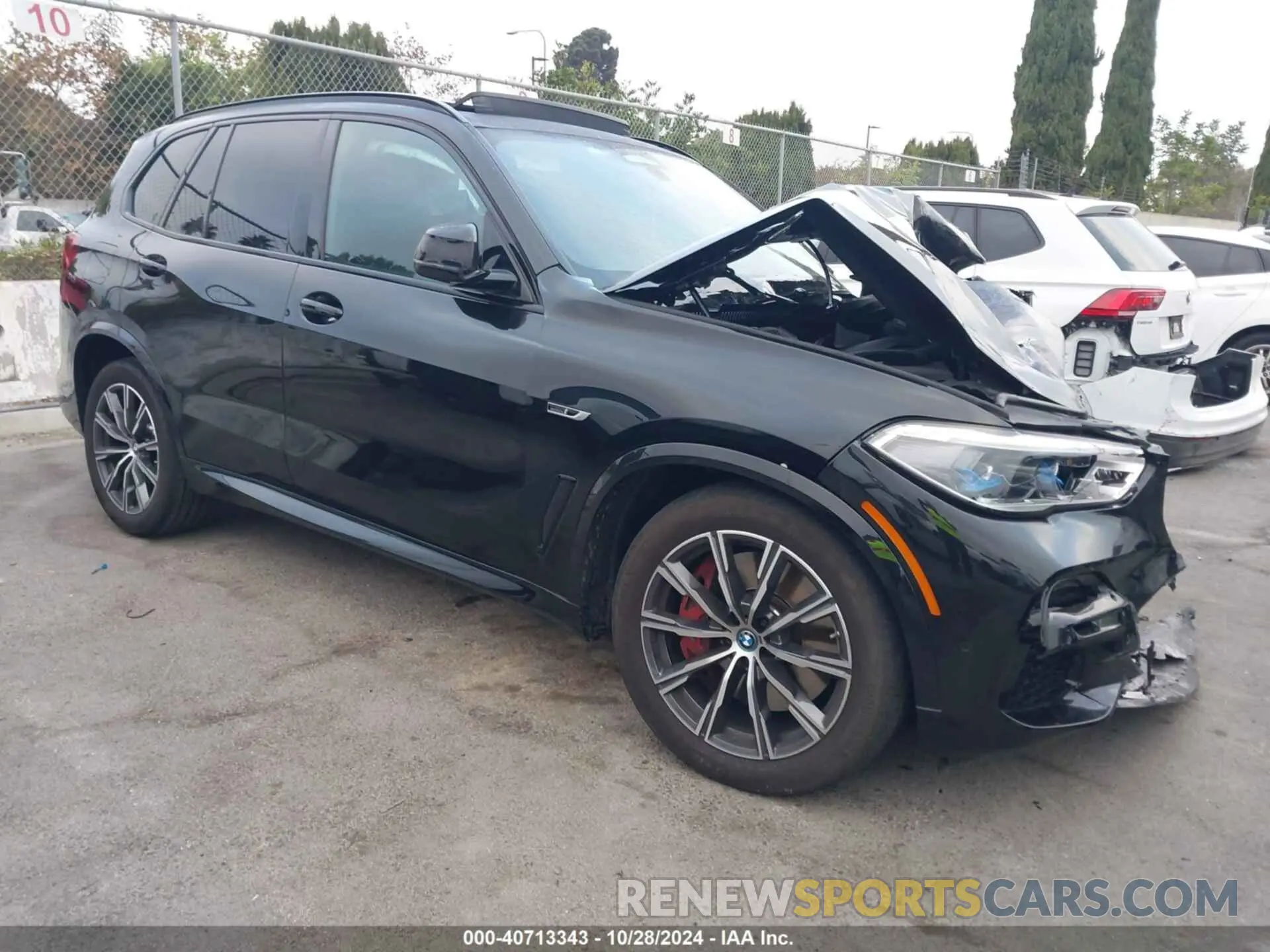 1 Photograph of a damaged car 5UXTA6C02P9P59732 BMW X5 PHEV 2023