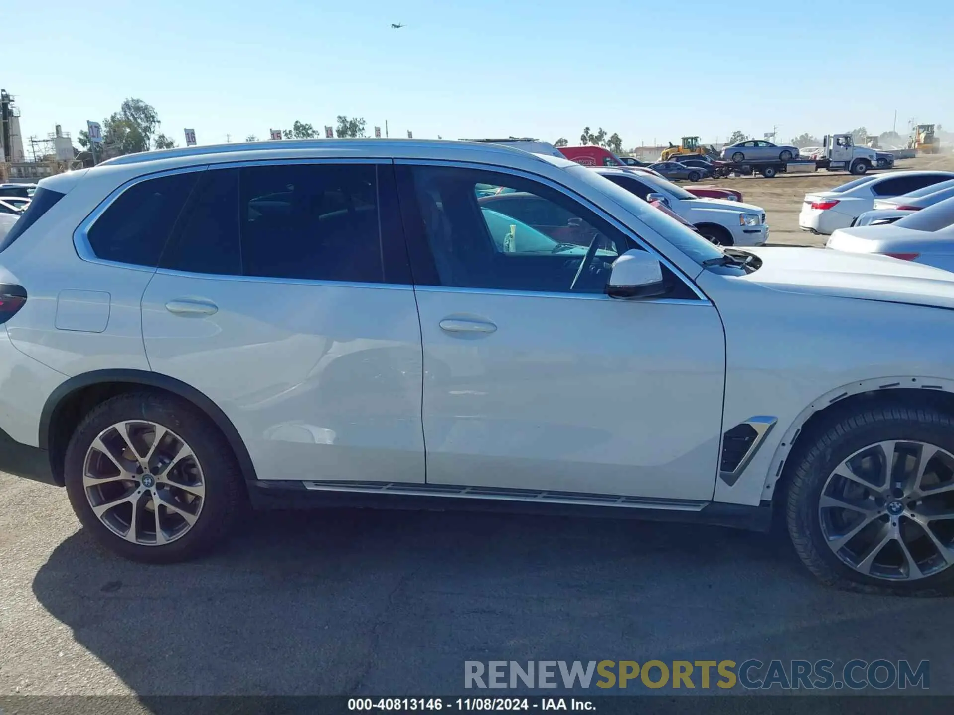 14 Photograph of a damaged car 5UX43EU08R9T33098 BMW X5 PHEV 2024
