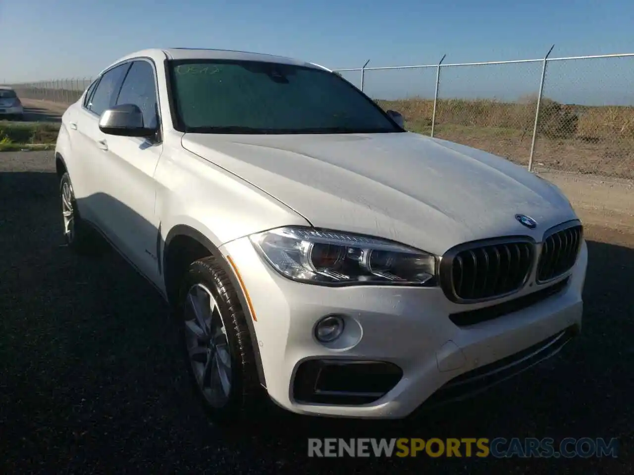 1 Photograph of a damaged car 5UXKU0C50K0G92673 BMW X6 2019