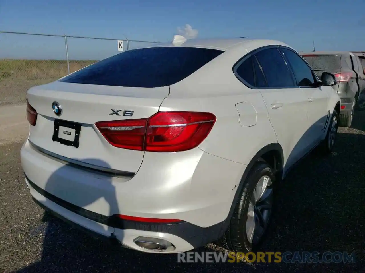 4 Photograph of a damaged car 5UXKU0C50K0G92673 BMW X6 2019