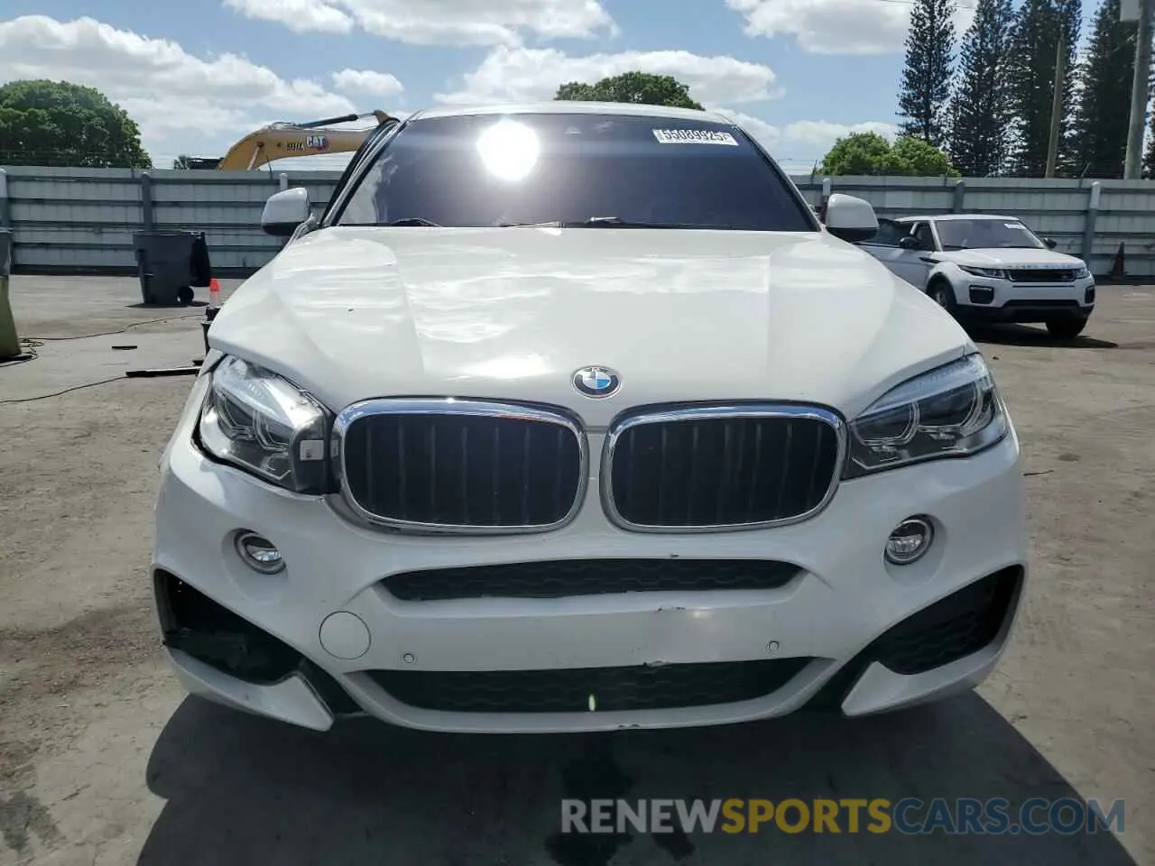 5 Photograph of a damaged car 5UXKU0C50K0H99495 BMW X6 2019