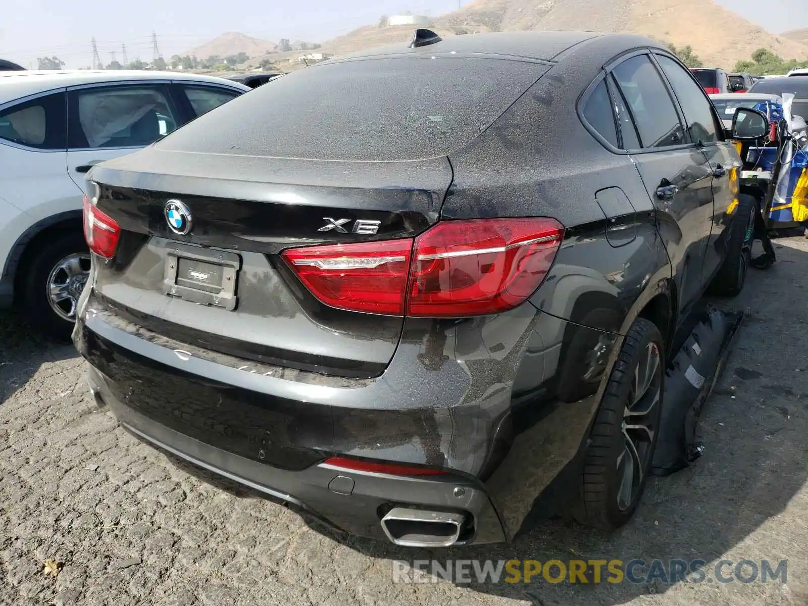 4 Photograph of a damaged car 5UXKU2C51K0Z64396 BMW X6 2019