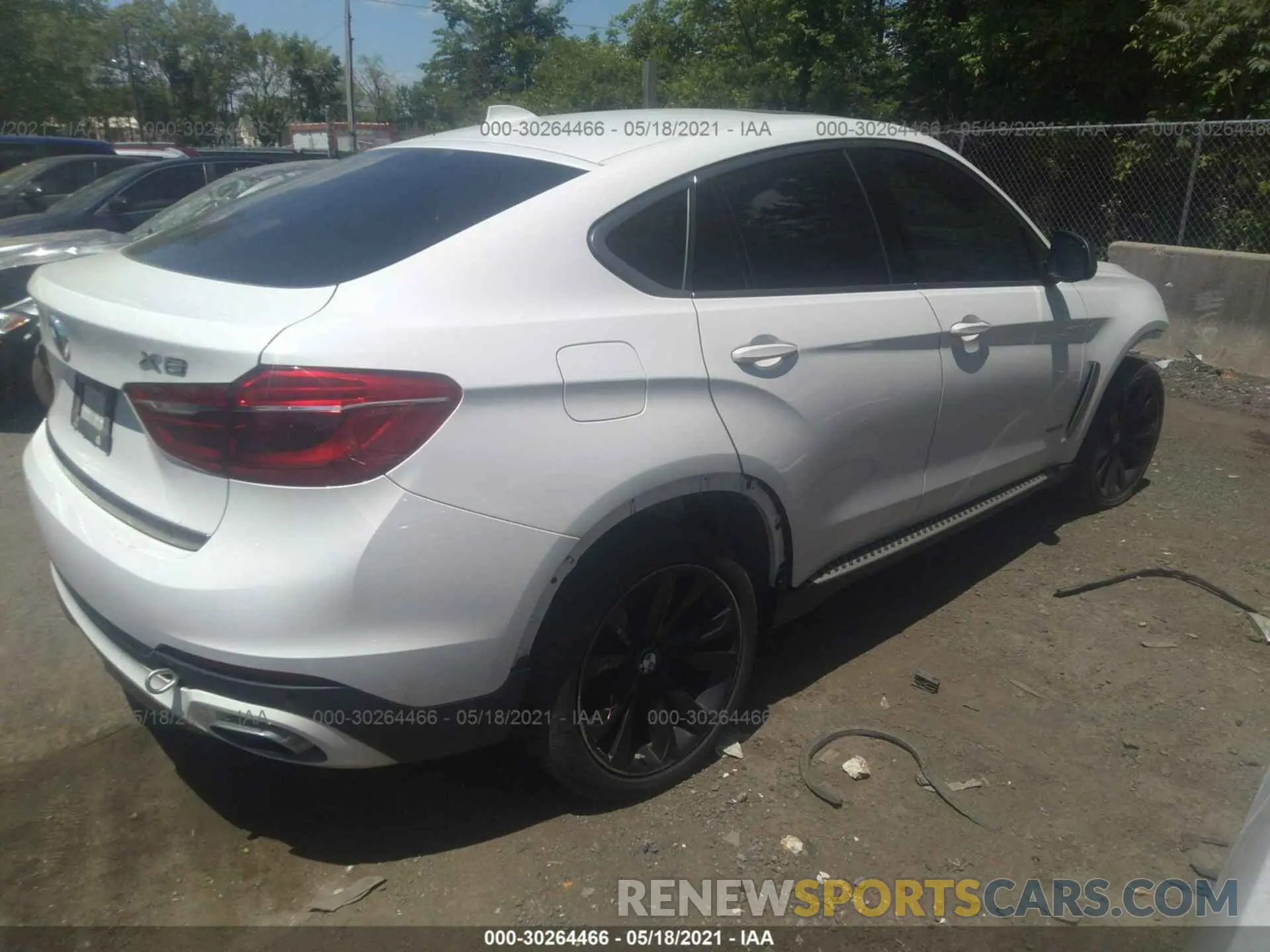 4 Photograph of a damaged car 5UXKU2C53K0Z63461 BMW X6 2019