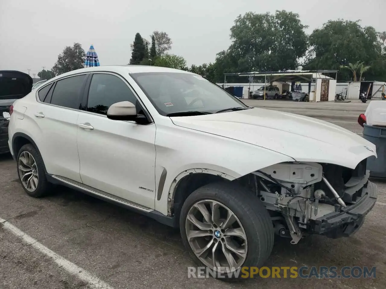 4 Photograph of a damaged car 5UXKU2C55K0Z64580 BMW X6 2019
