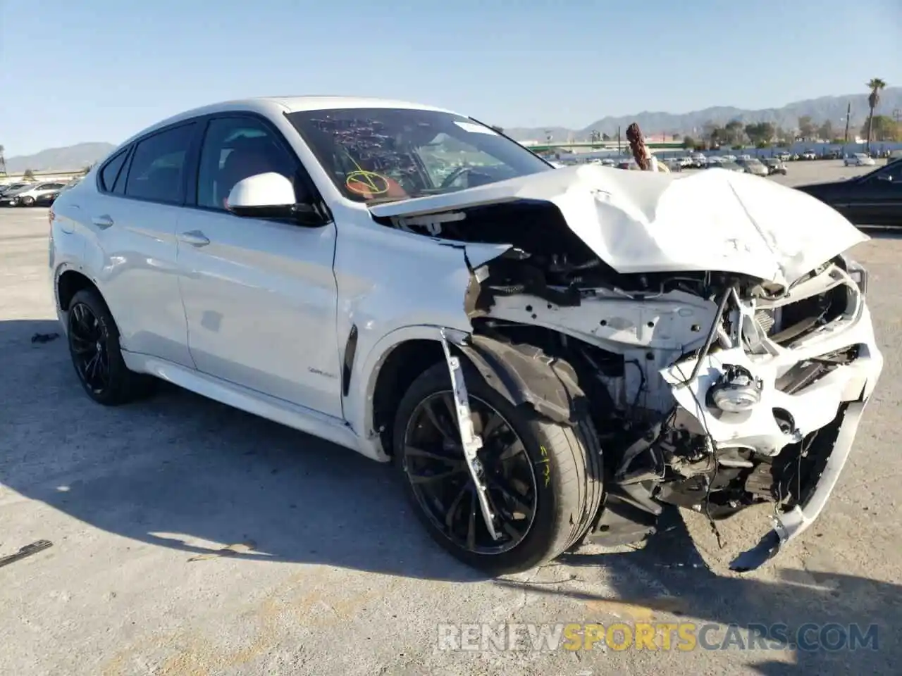 1 Photograph of a damaged car 5UXKU2C56K0Z65978 BMW X6 2019