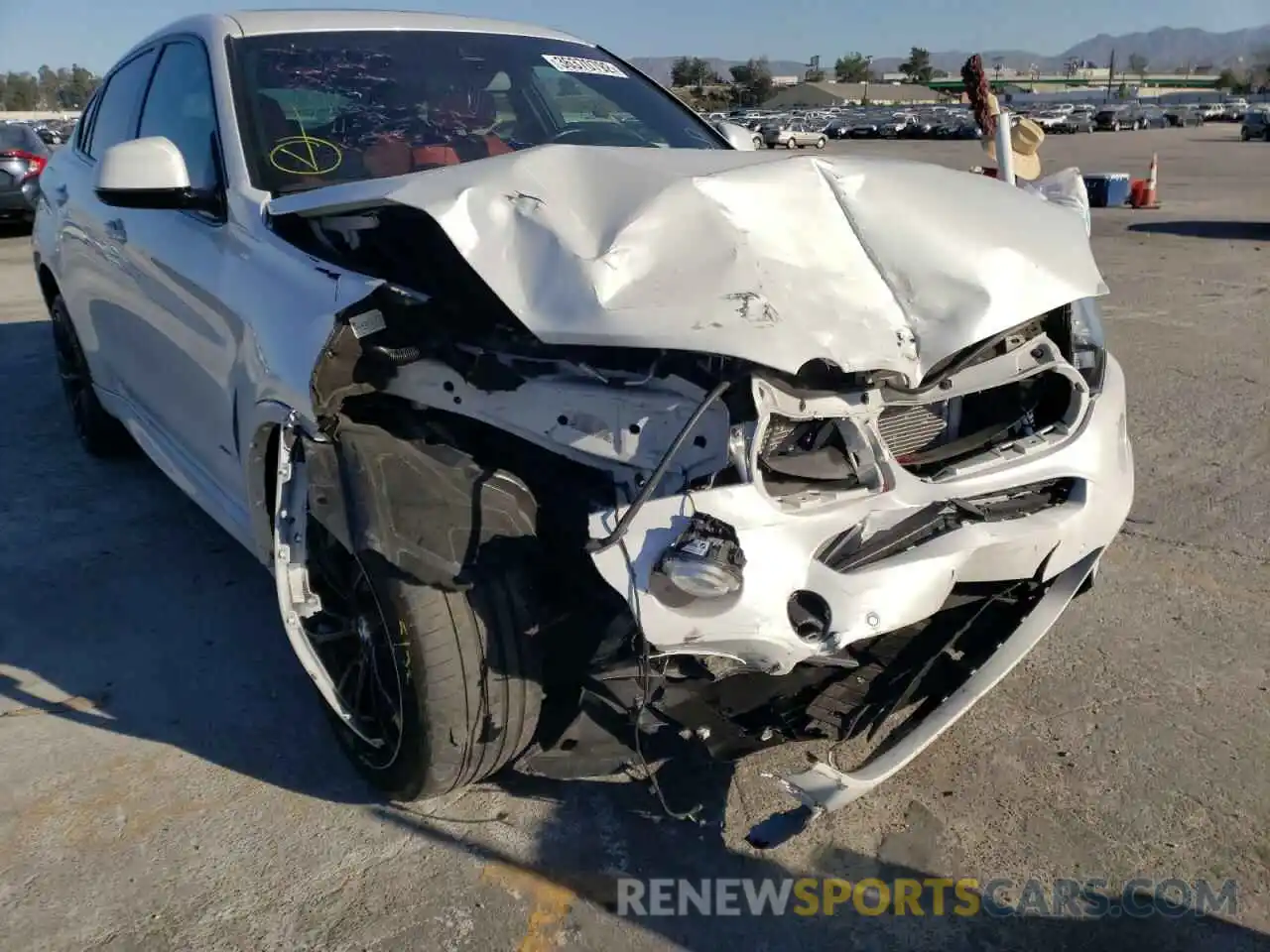 9 Photograph of a damaged car 5UXKU2C56K0Z65978 BMW X6 2019