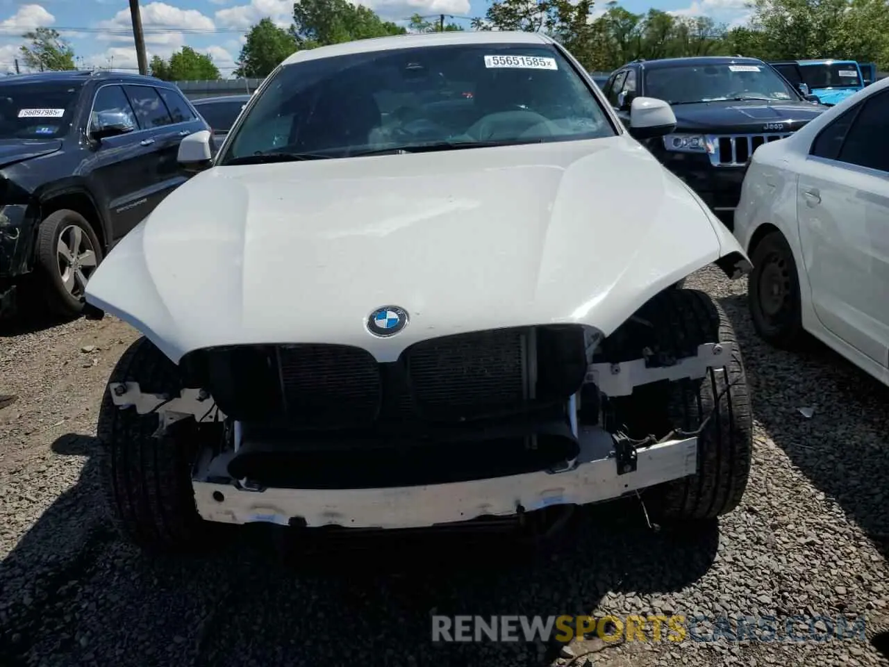 5 Photograph of a damaged car 5UXKU2C57K0Z64306 BMW X6 2019