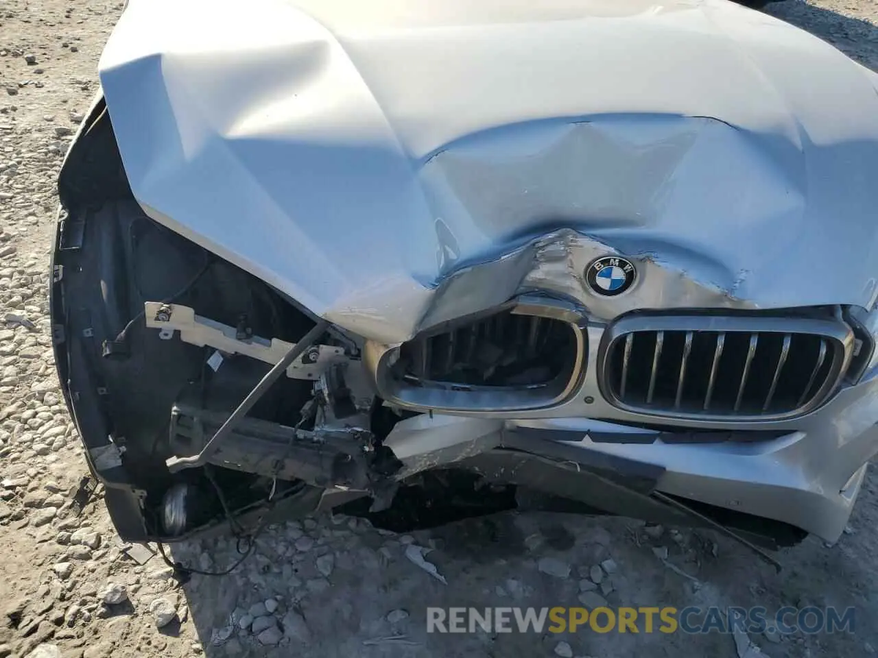 11 Photograph of a damaged car 5UXKU2C58K0Z63536 BMW X6 2019