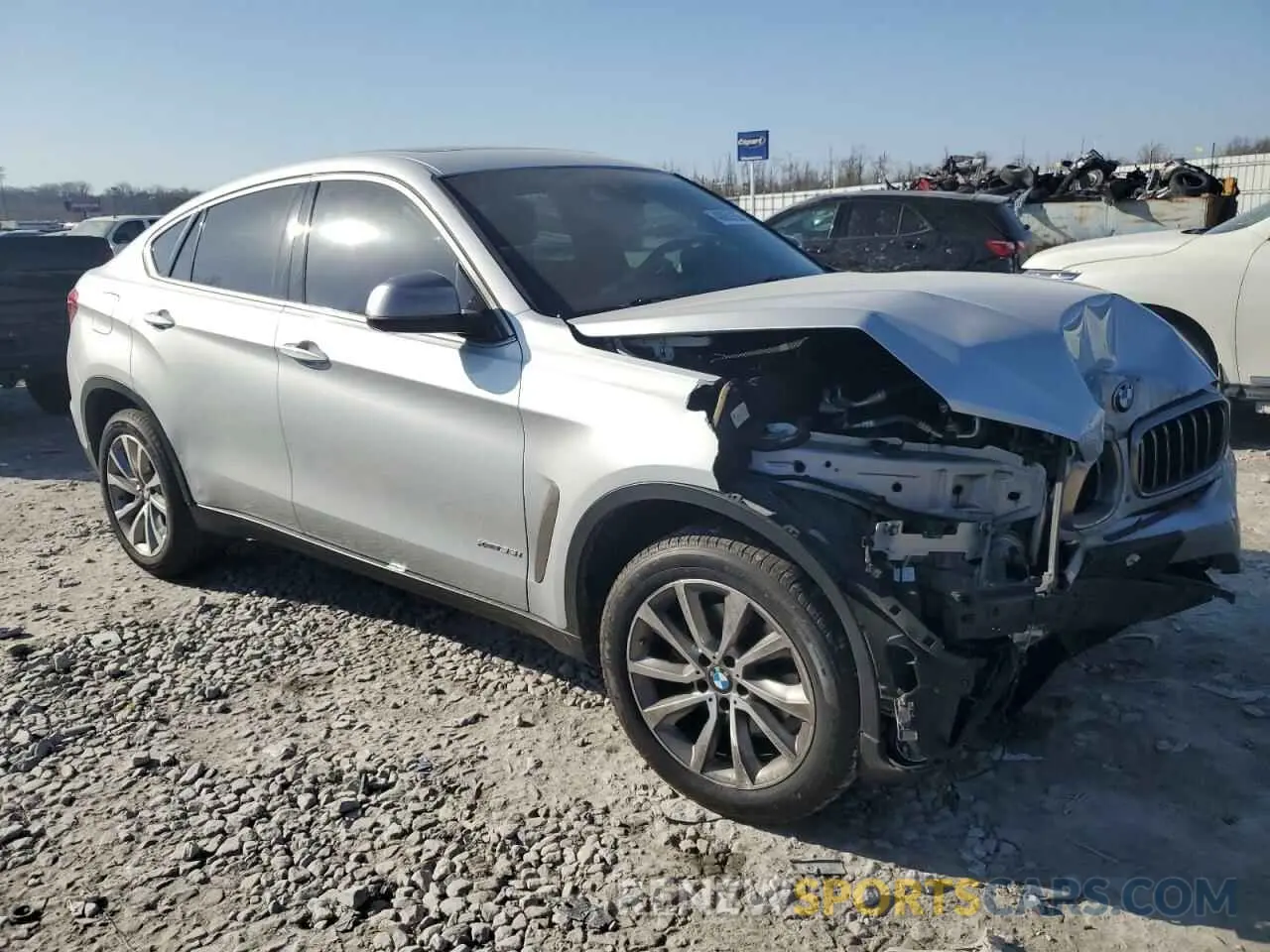 4 Photograph of a damaged car 5UXKU2C58K0Z63536 BMW X6 2019