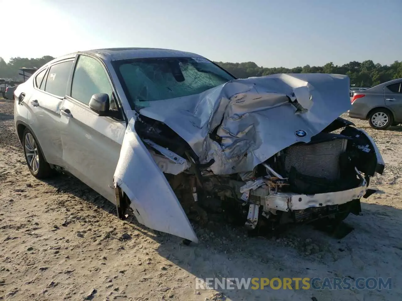 1 Photograph of a damaged car 5UXKU2C58K0Z65965 BMW X6 2019