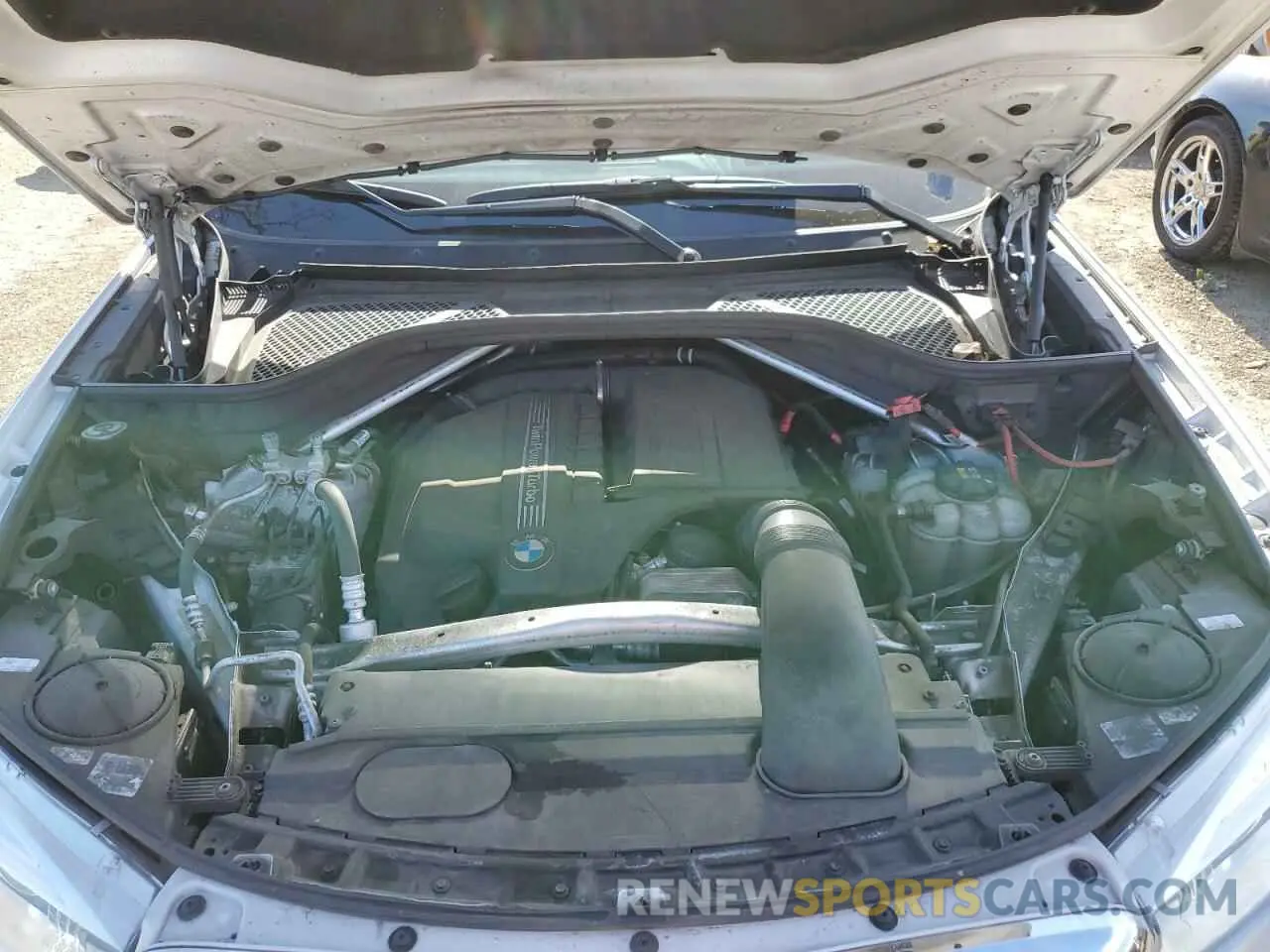 12 Photograph of a damaged car 5UXKU2C5XK0Z63134 BMW X6 2019