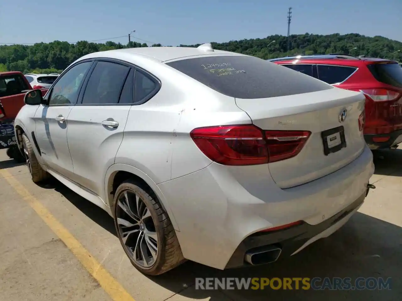 3 Photograph of a damaged car 5UXKU6C54KLP60441 BMW X6 2019