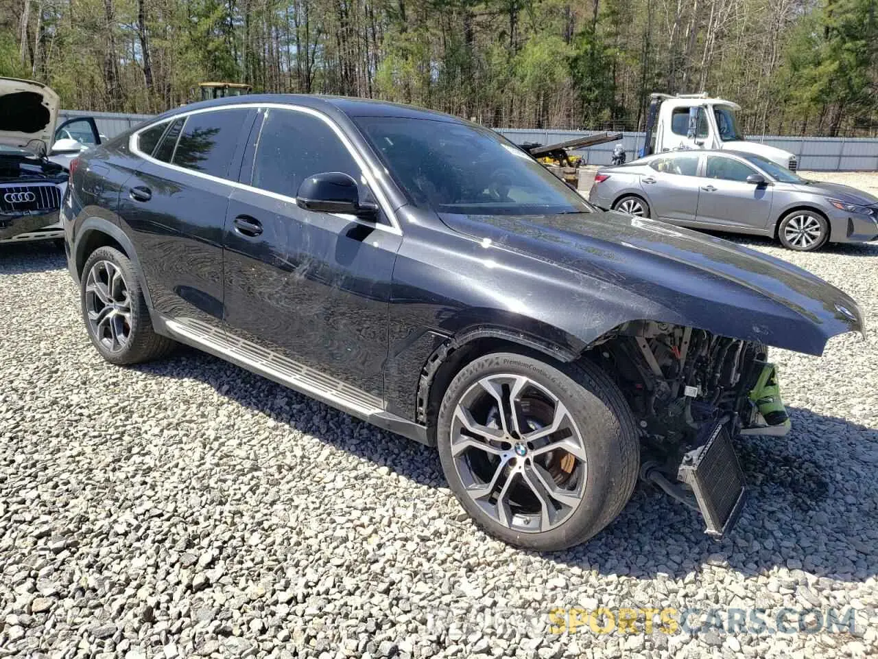 4 Photograph of a damaged car 5UXCY4C03M9H58300 BMW X6 2021