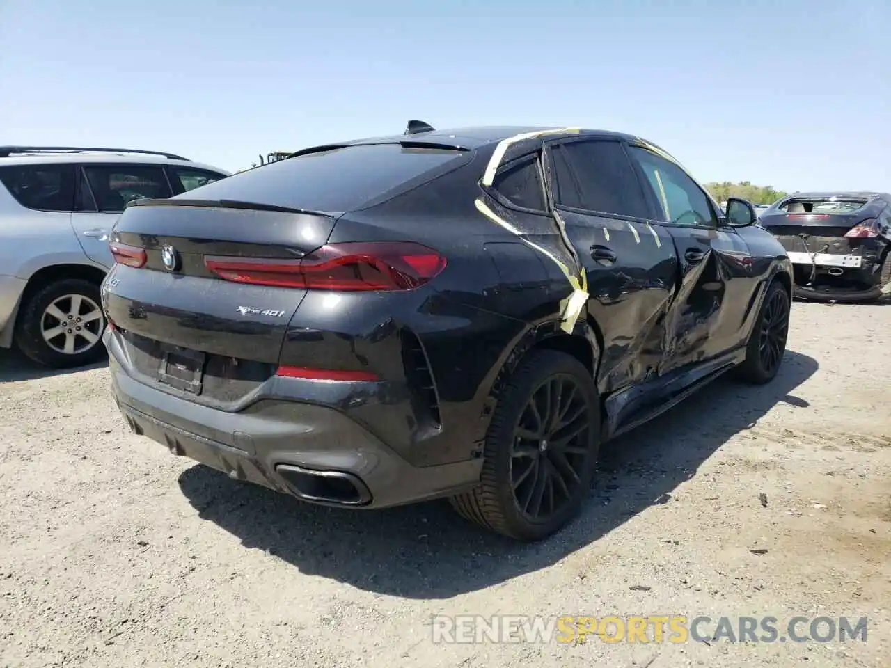 4 Photograph of a damaged car 5UXCY6C00M9G02579 BMW X6 2021