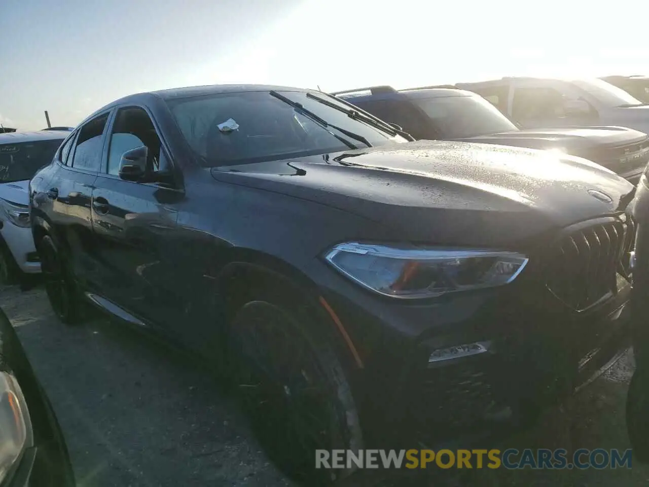 4 Photograph of a damaged car 5UXCY6C08M9H49846 BMW X6 2021