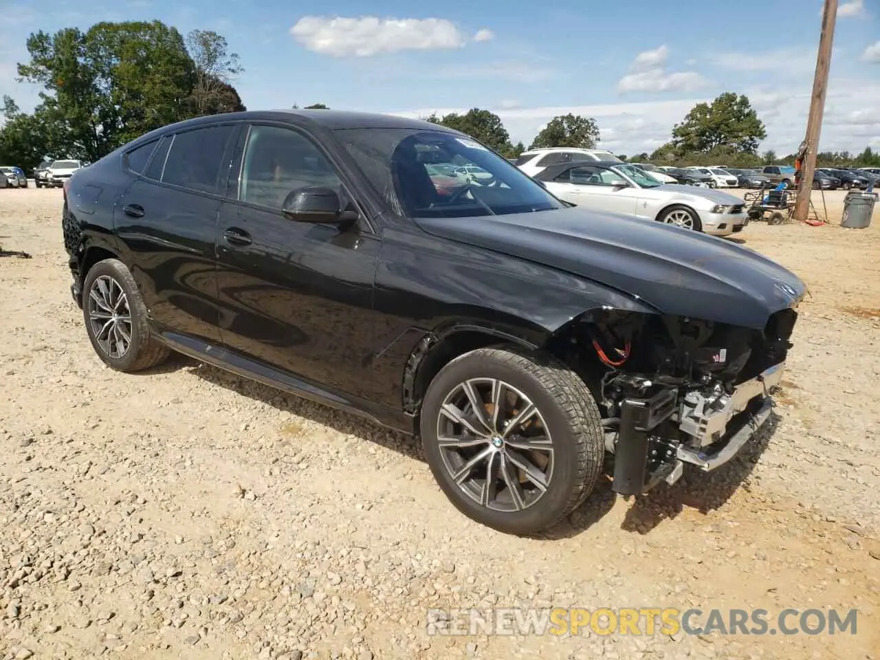 4 Photograph of a damaged car 5UXCY8C06M9F17046 BMW X6 2021