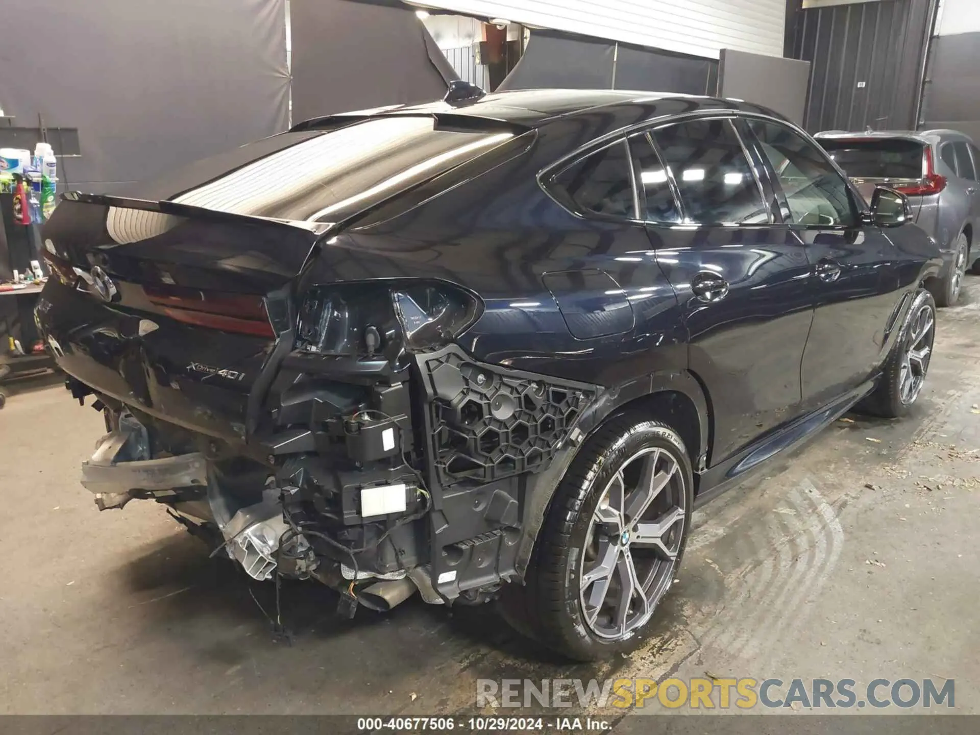 4 Photograph of a damaged car 5UXCY6C00N9L31389 BMW X6 2022