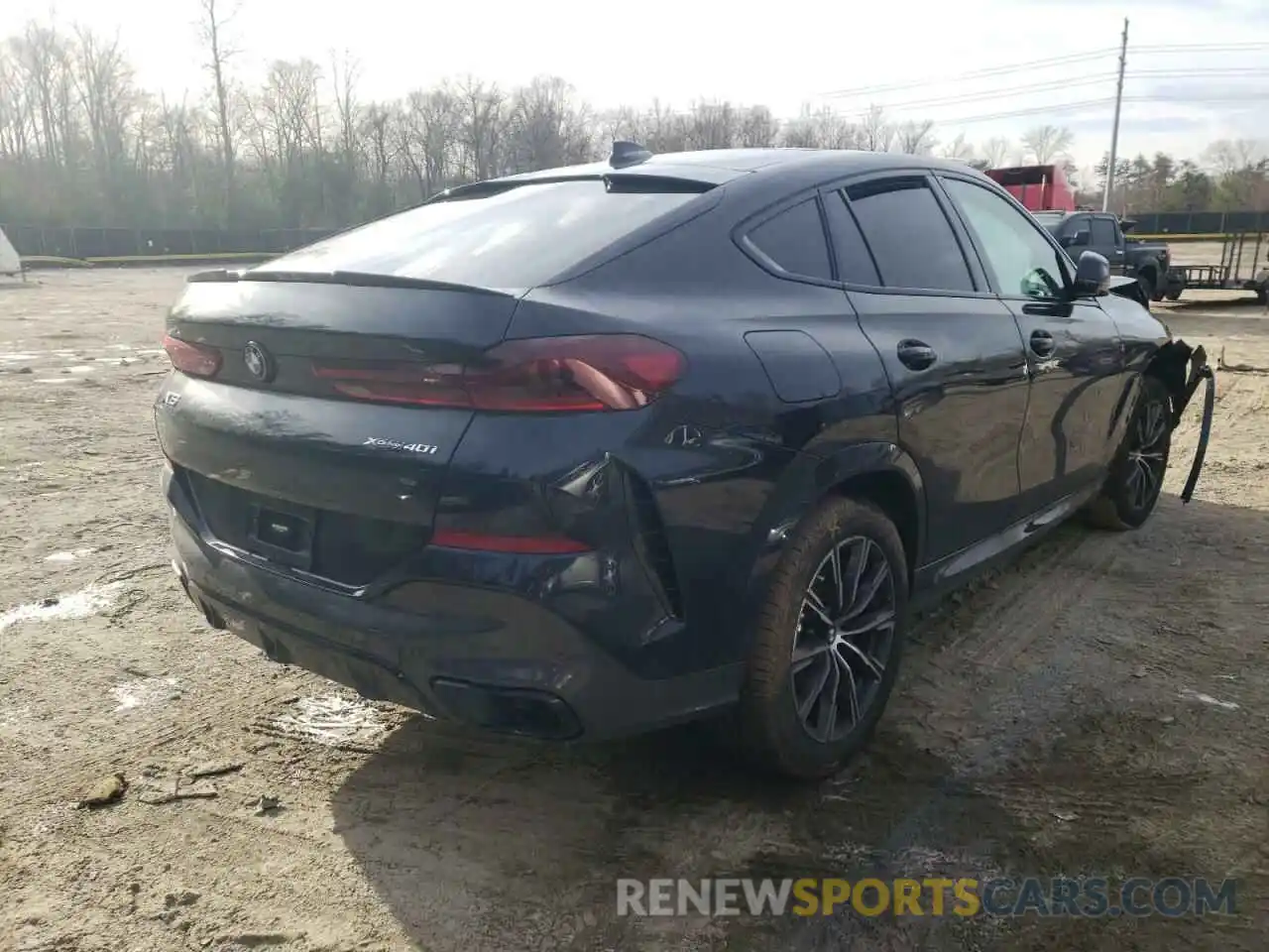 4 Photograph of a damaged car 5UXCY6C01N9K27591 BMW X6 2022