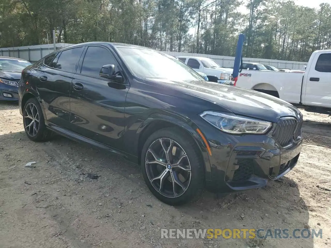 4 Photograph of a damaged car 5UXCY6C01N9K49185 BMW X6 2022