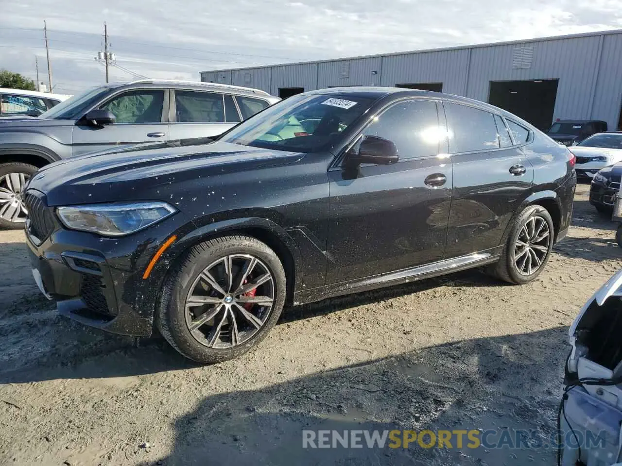 1 Photograph of a damaged car 5UXCY6C03N9J33387 BMW X6 2022