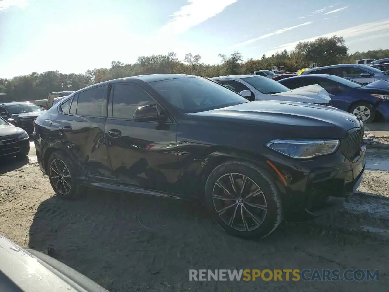4 Photograph of a damaged car 5UXCY6C03N9J33387 BMW X6 2022