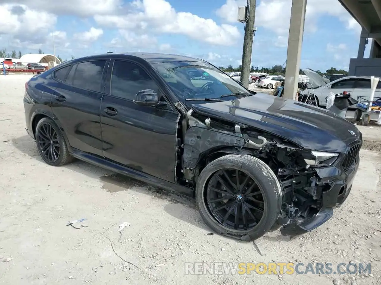 4 Photograph of a damaged car 5UXCY6C07N9L54152 BMW X6 2022