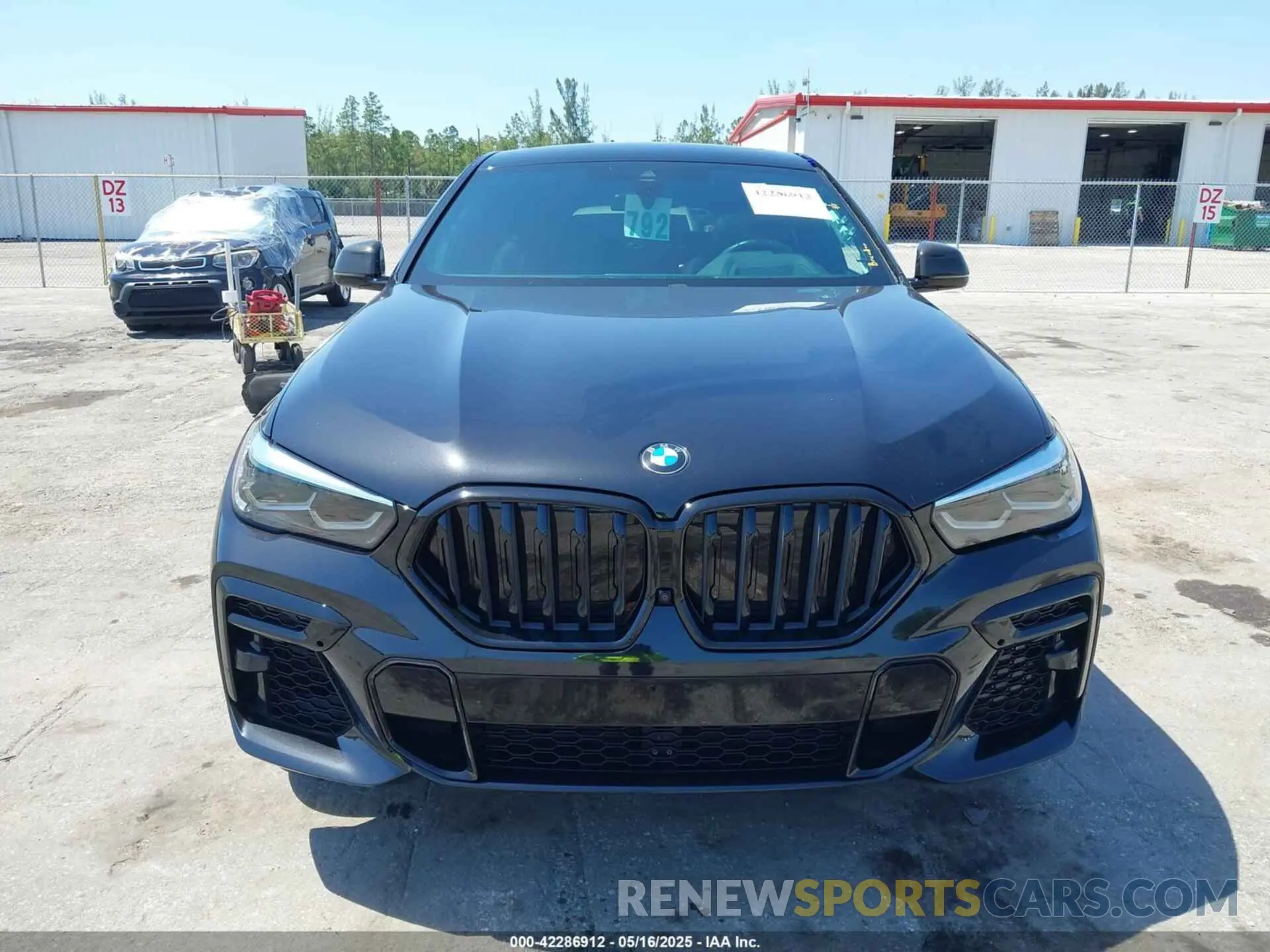13 Photograph of a damaged car 5UXCY6C09N9L97438 BMW X6 2022