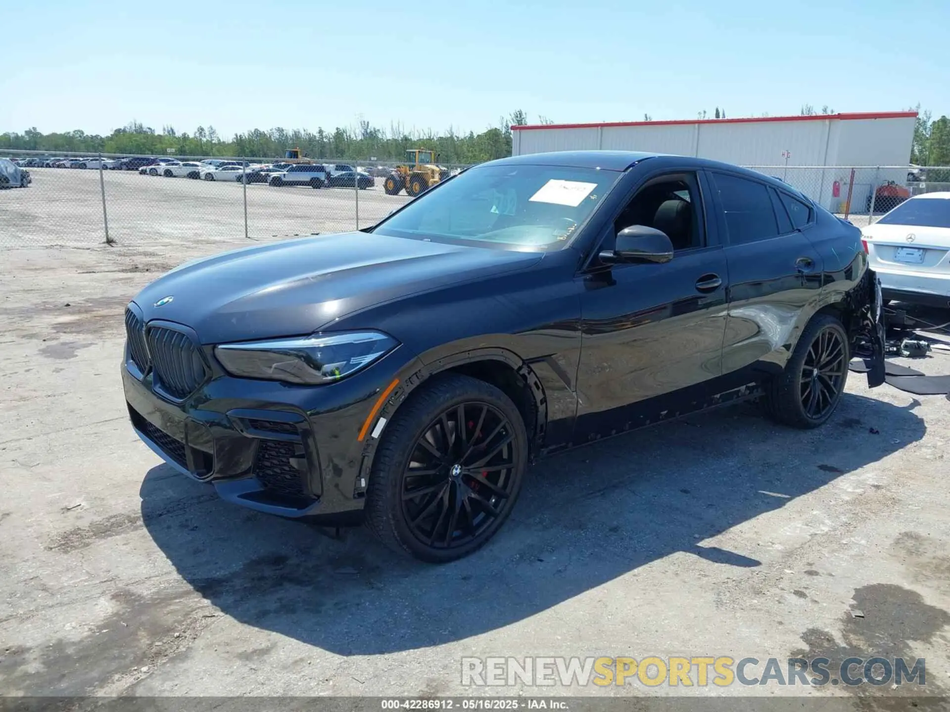 2 Photograph of a damaged car 5UXCY6C09N9L97438 BMW X6 2022