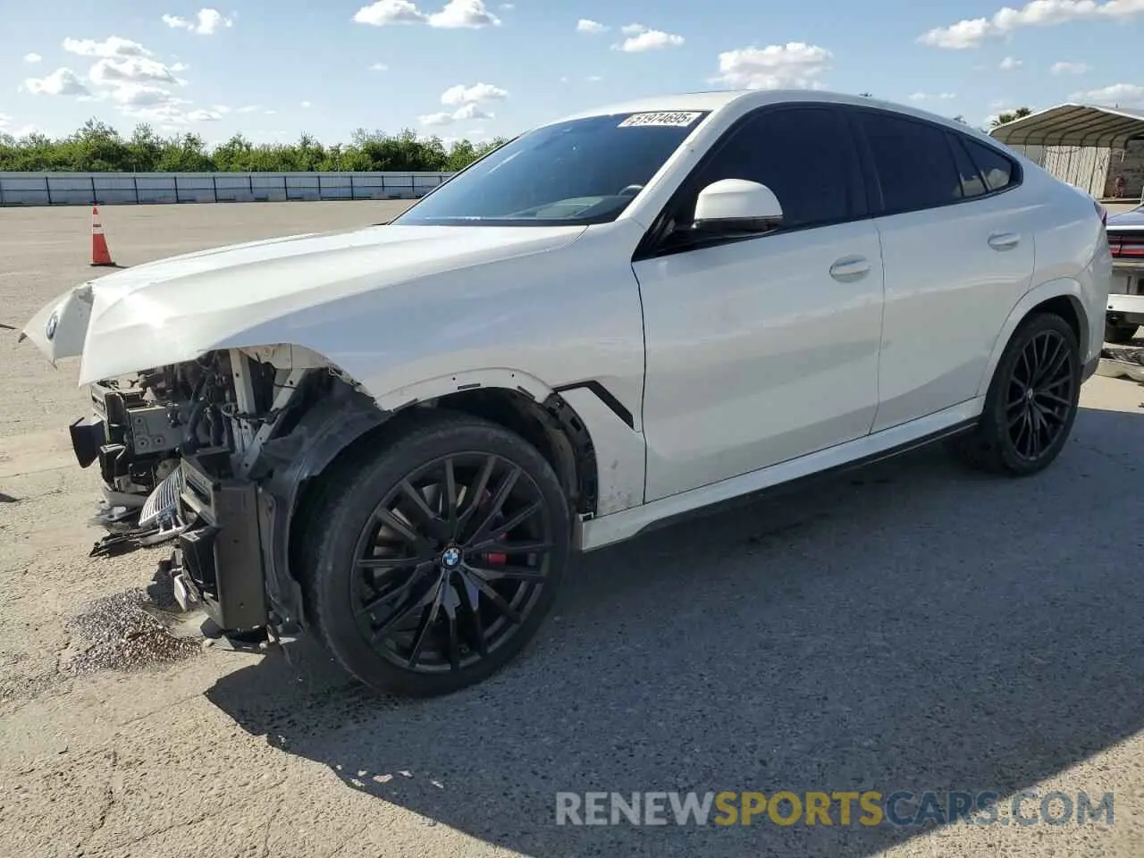 1 Photograph of a damaged car 5UXCY6C04P9P49005 BMW X6 2023
