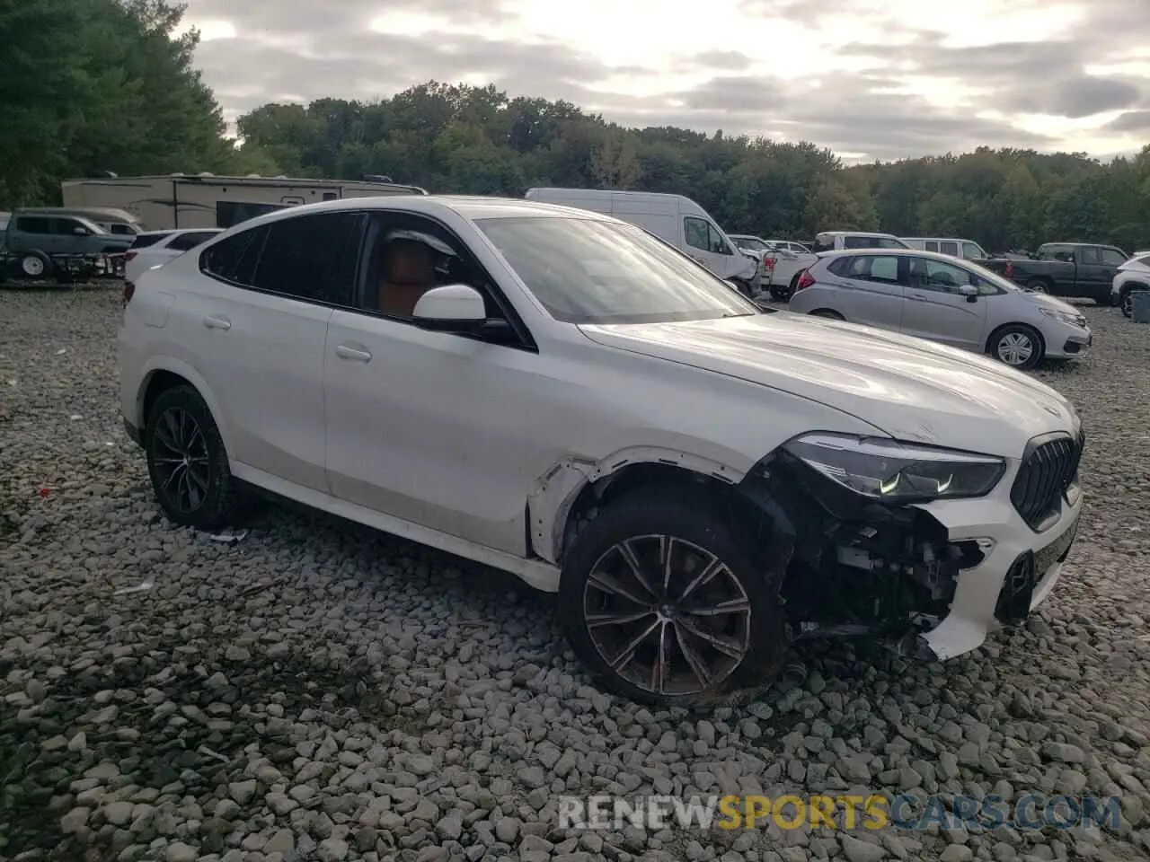 4 Photograph of a damaged car 5UXCY6C07P9P59558 BMW X6 2023