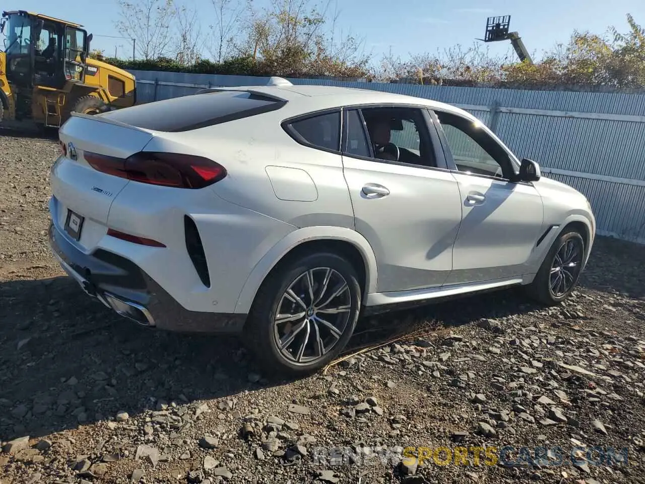 3 Photograph of a damaged car 5UXCY6C0XP9P39384 BMW X6 2023