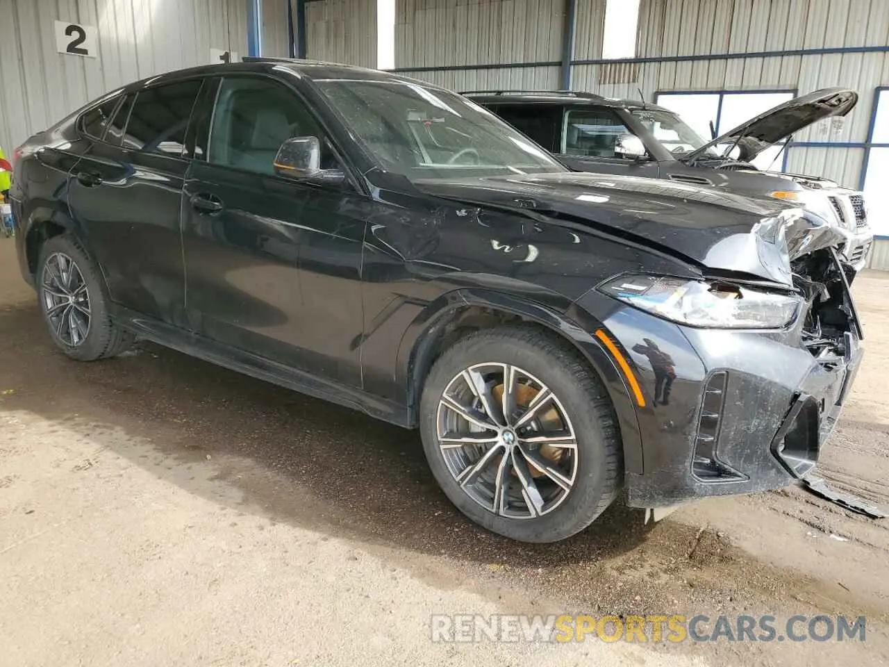 4 Photograph of a damaged car 5UX33EX01S9Z31322 BMW X6 2025