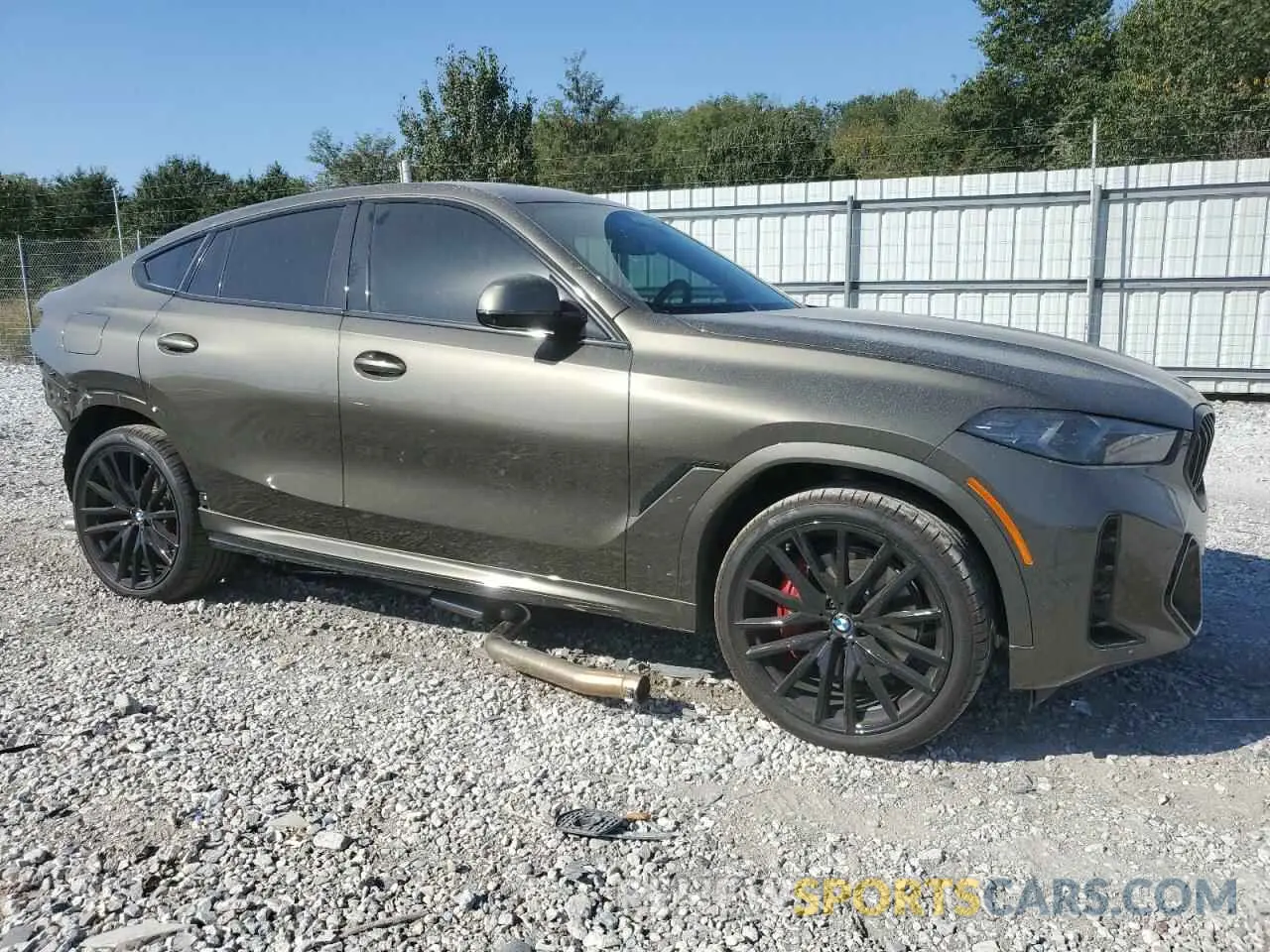 4 Photograph of a damaged car 5UX33EX02S9X11137 BMW X6 2025