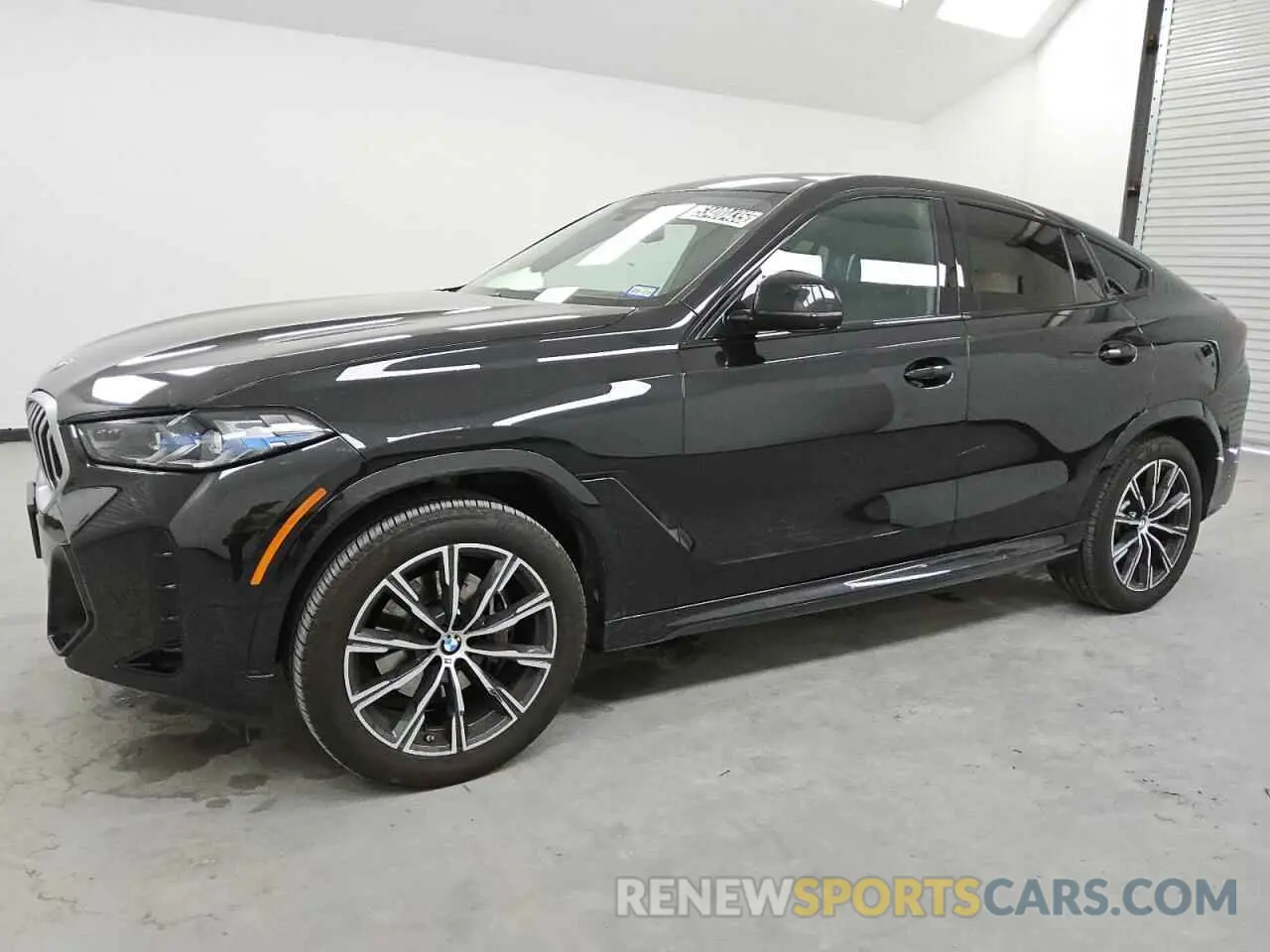 1 Photograph of a damaged car 5UX33EX05S9X14596 BMW X6 2025