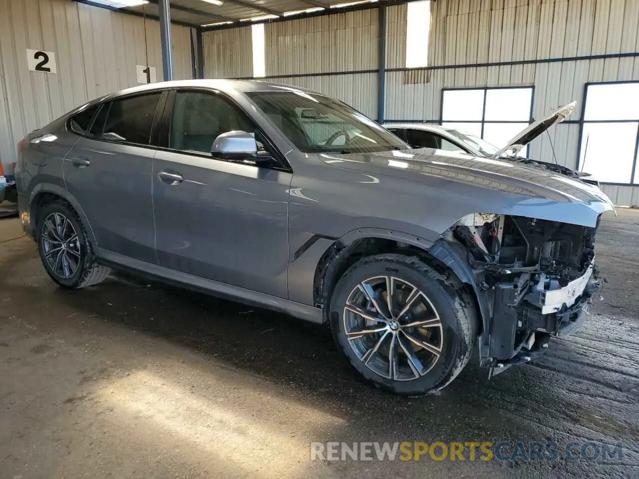 4 Photograph of a damaged car 5UX33EX06S9X36591 BMW X6 2025