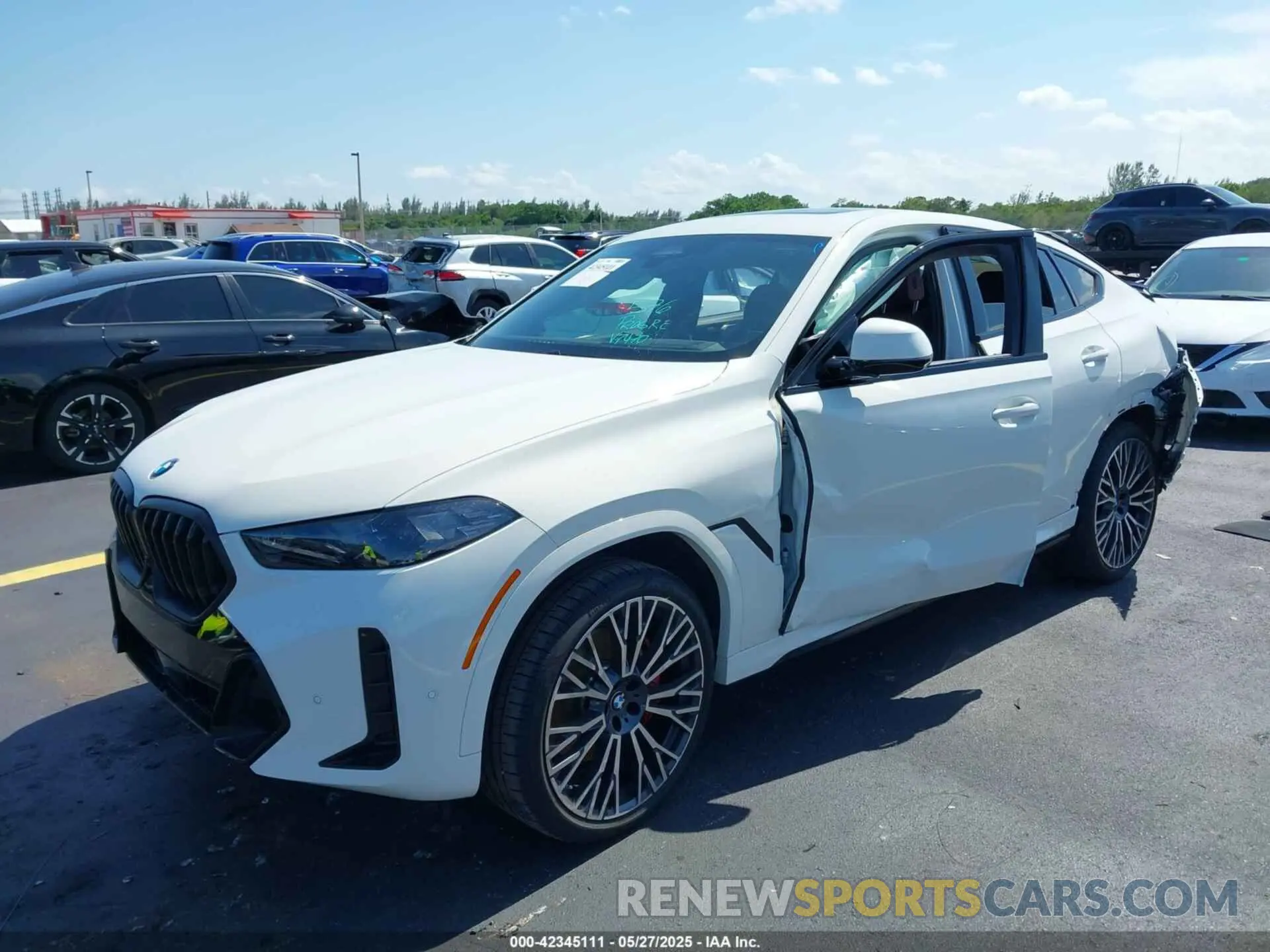 2 Photograph of a damaged car 5UX33EX08S9Y77470 BMW X6 2025