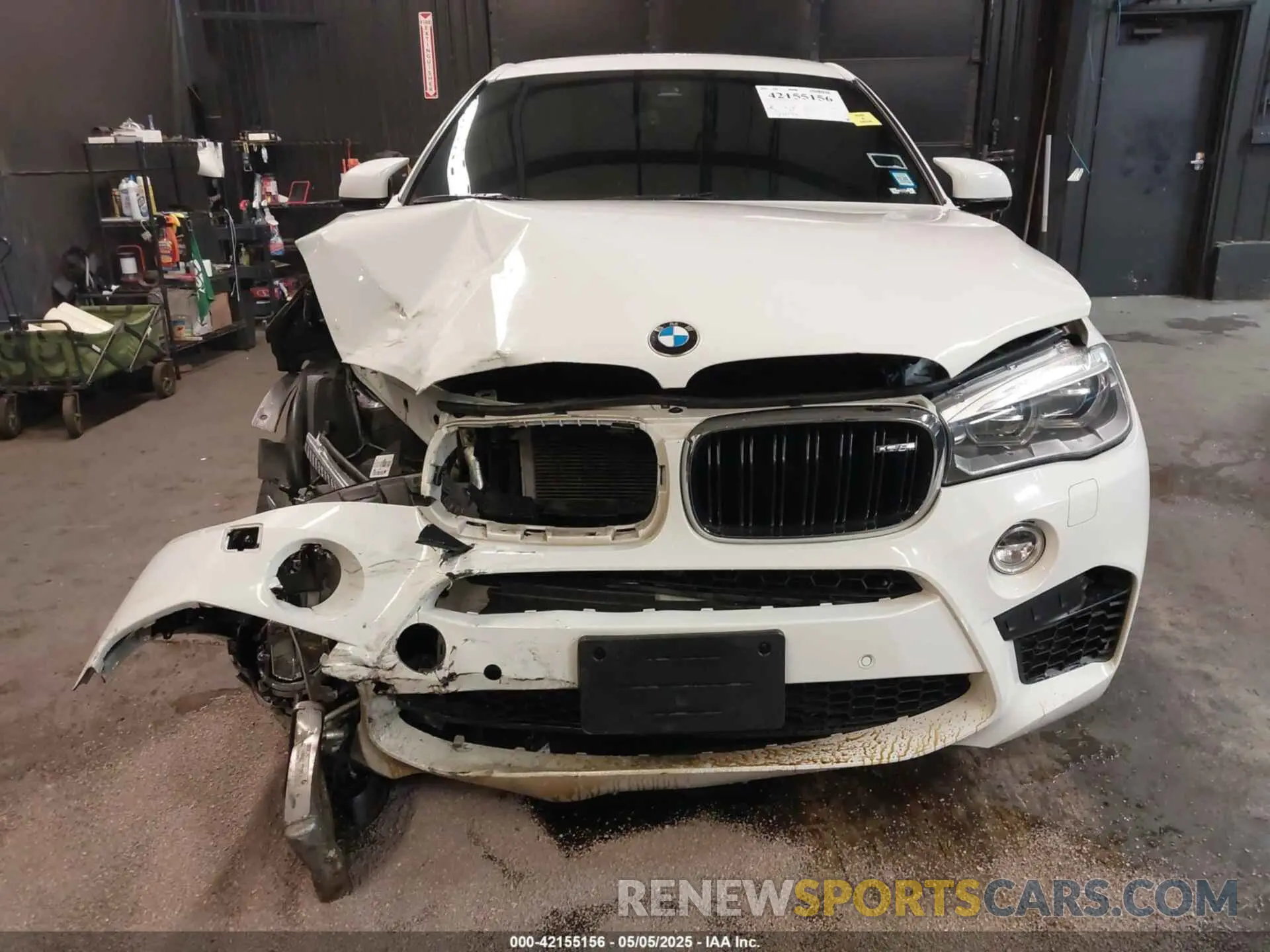 12 Photograph of a damaged car 5YMKW8C54K0Y75055 BMW X6 M 2019