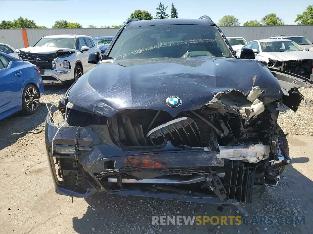5 Photograph of a damaged car 5UXCW2C50KL081998 BMW X7 2019