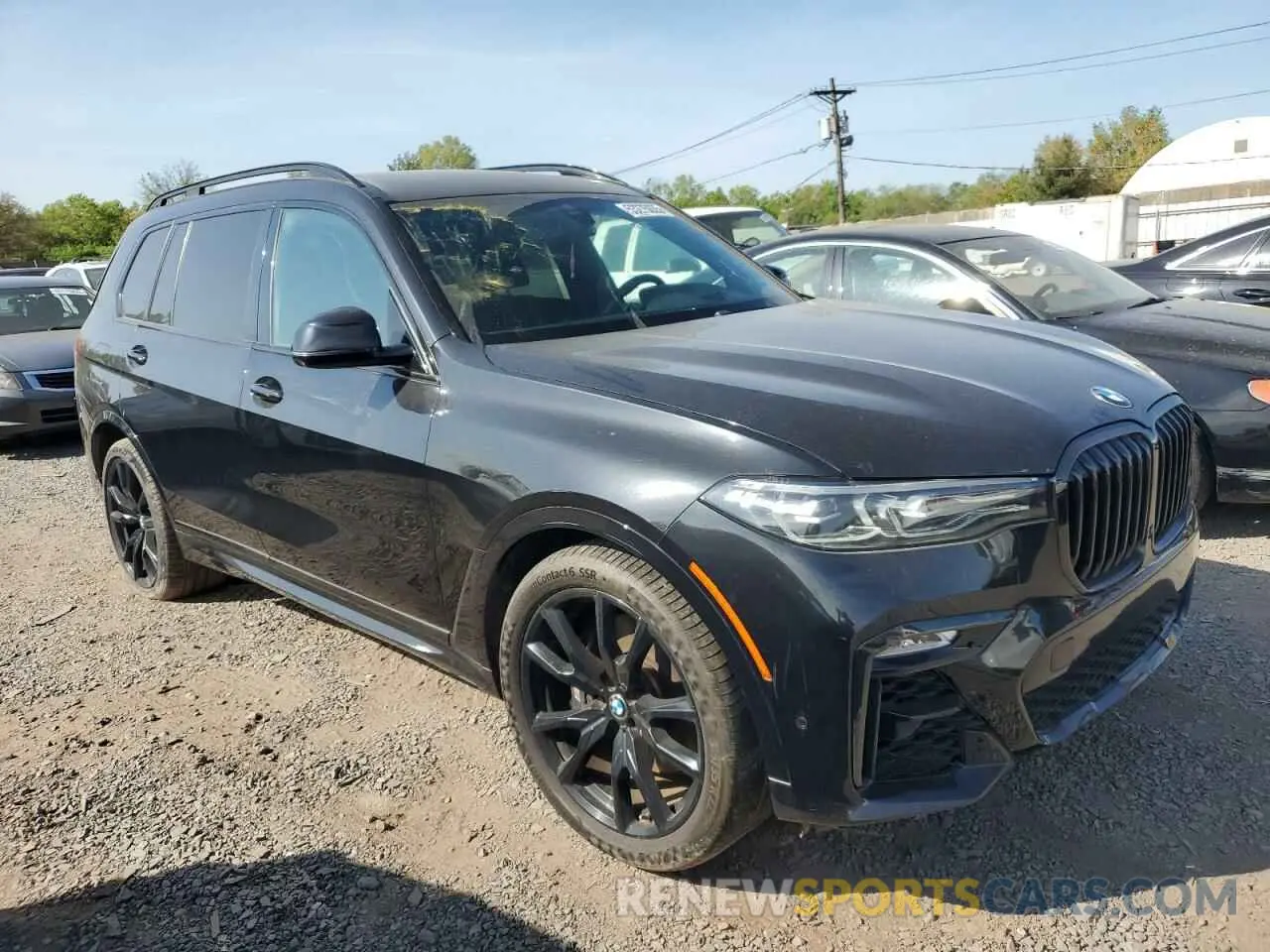 4 Photograph of a damaged car 5UXCW2C00M9H04673 BMW X7 2021