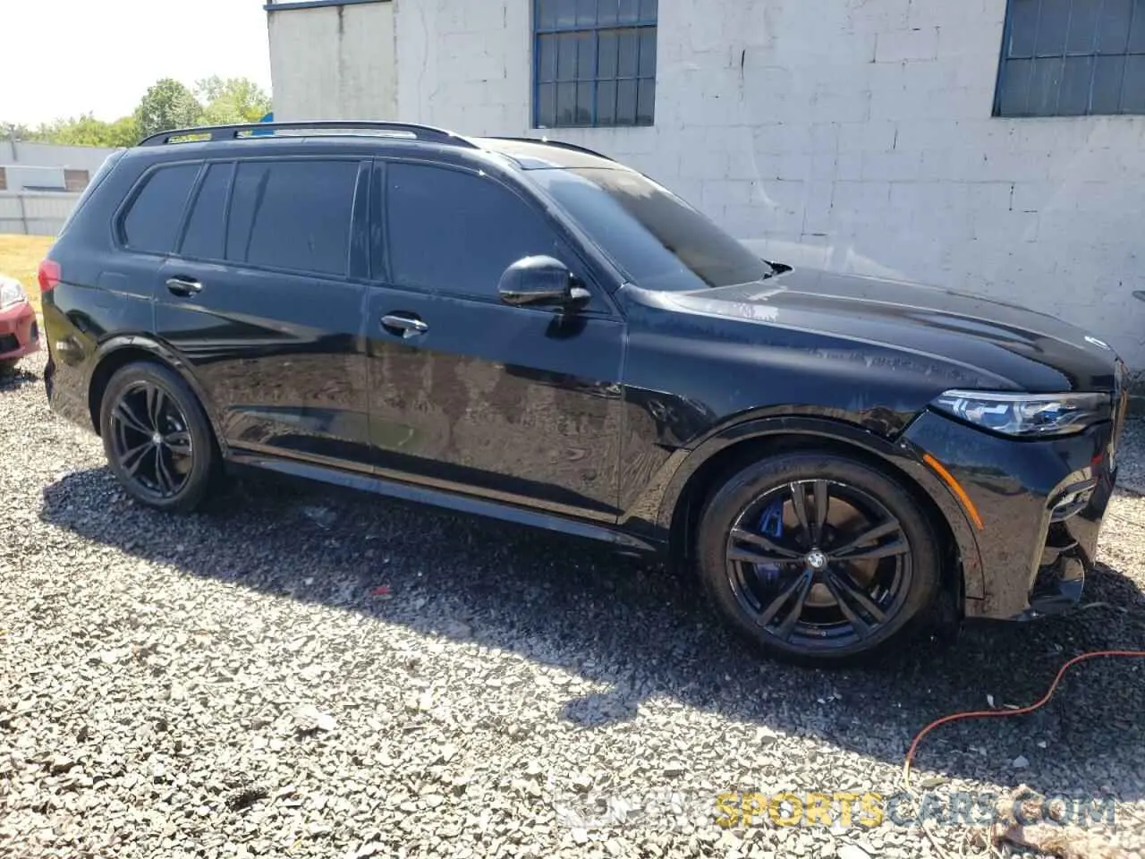 4 Photograph of a damaged car 5UXCX6C08M9F30579 BMW X7 2021