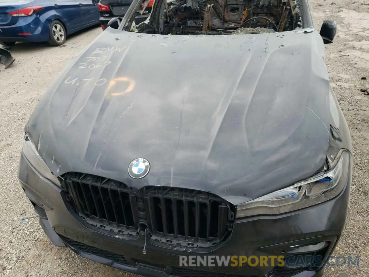 11 Photograph of a damaged car 5UXCX6C01N9K20496 BMW X7 2022