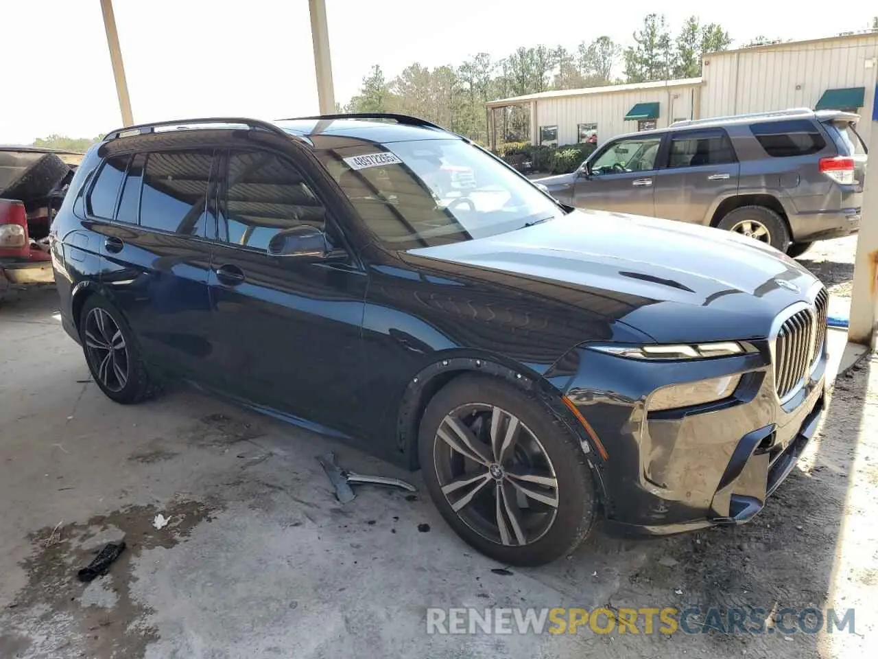 4 Photograph of a damaged car 5UX23EM07P9R68656 BMW X7 2023