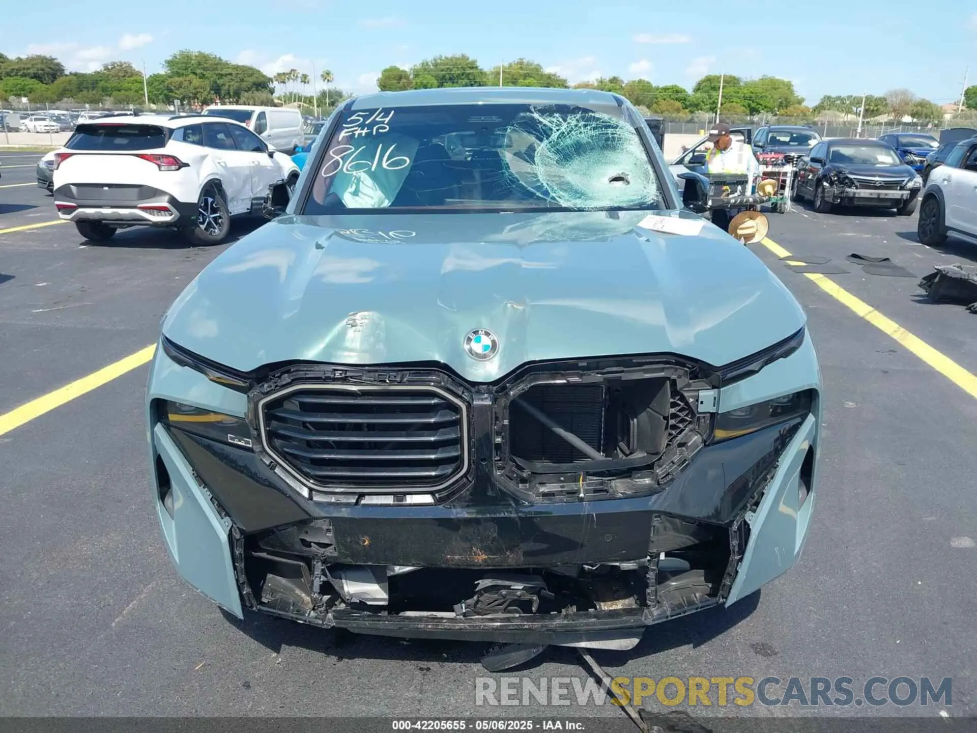 12 Photograph of a damaged car 5YM23CS00P9R58616 BMW XM 2023